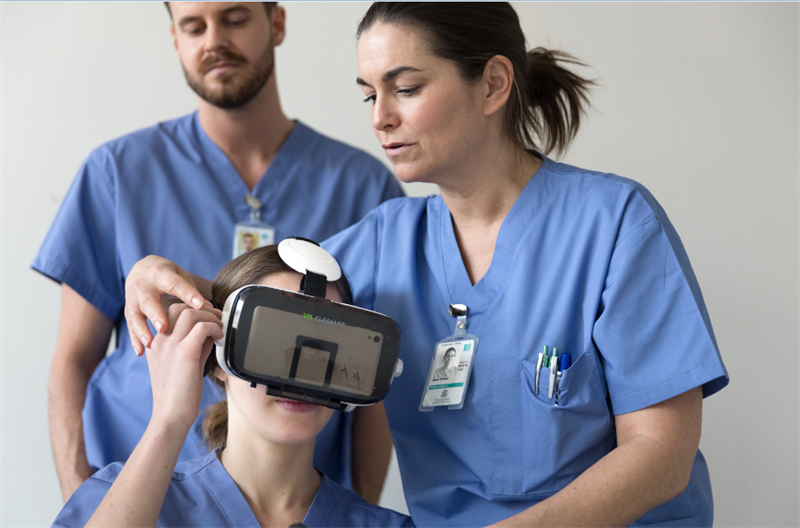 Doctor shown wearing virtual reality goggles.